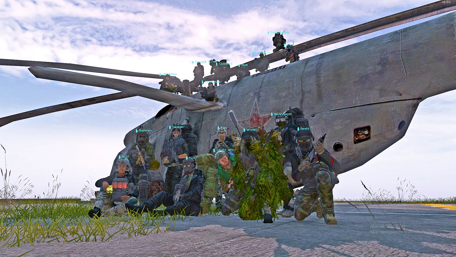 The IRS DayZ crew gathered around a helicopter